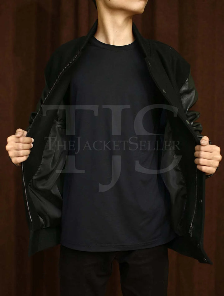 Minimalist black jacket with premium leather sleeves