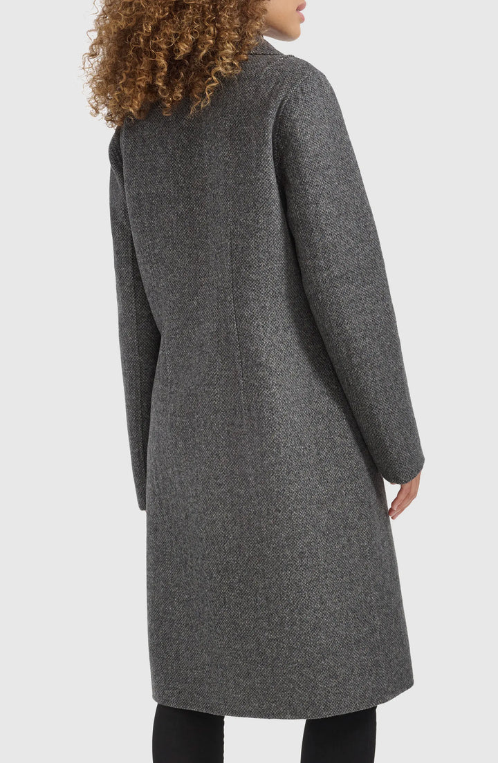 Minimalist single breasted coat made from double faced wool blend in USA
