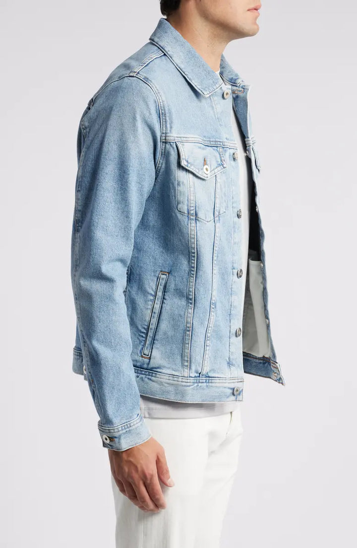 Dart denim trucker jacket featuring signature button front in USA