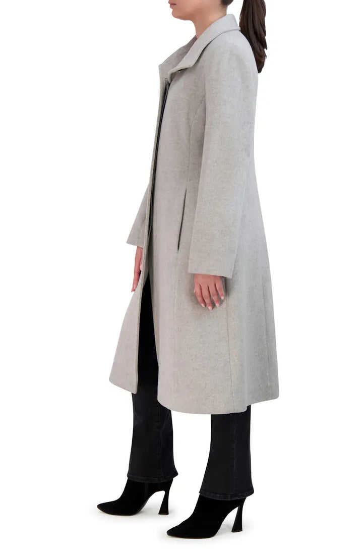 Elegant longline coat made from soft wool blend fabric in USA