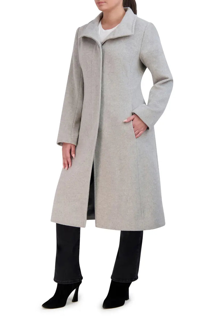 Wool blend overcoat featuring extended length and clean design in USA