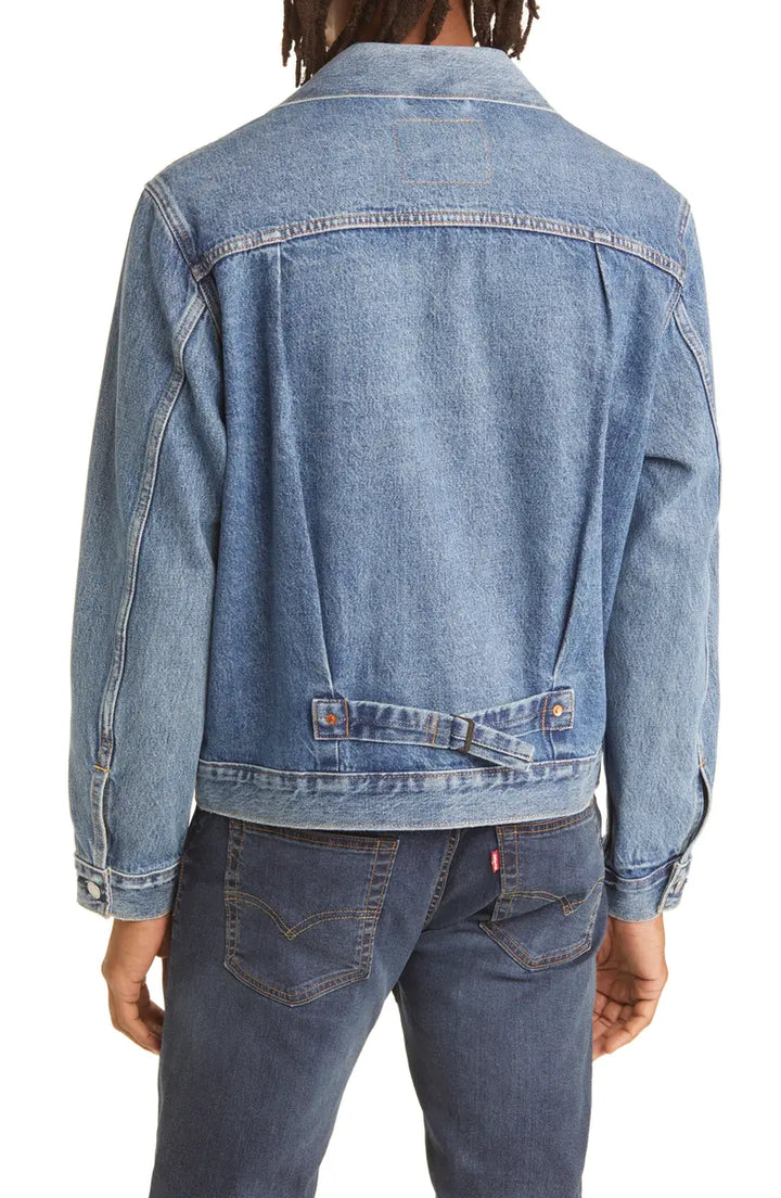 Raw denim trucker jacket with copper rivet detailing in USA