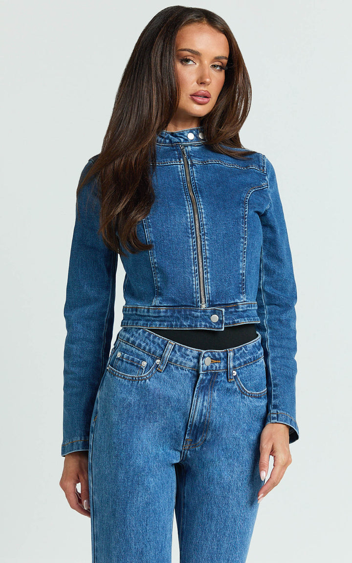 Women's fitted denim jacket with edgy biker look in USA