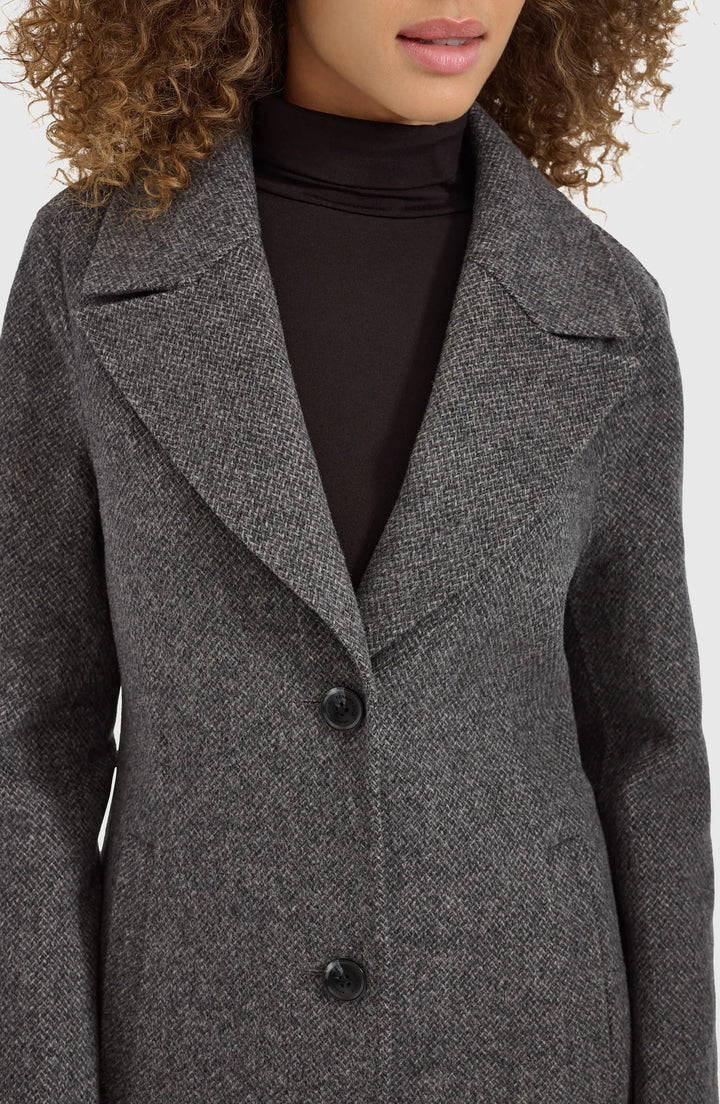 Double faced wool blend coat featuring a single button front in USA