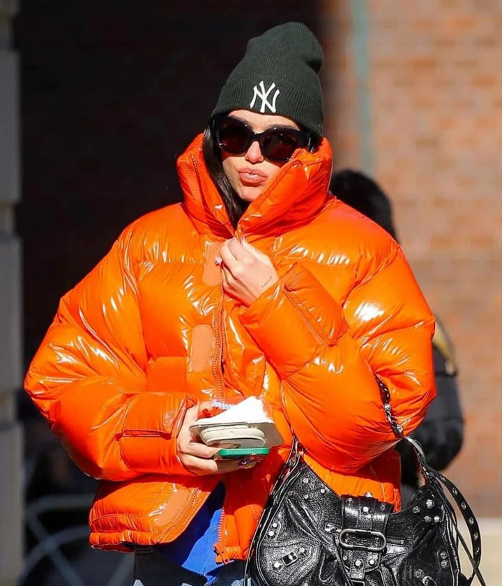 Dua Lipa down jacket in orange in France style