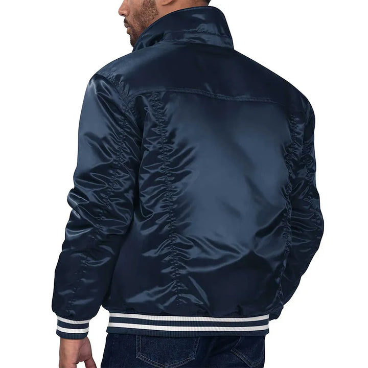 Navy blue bomber jacket worn by a person on a white background