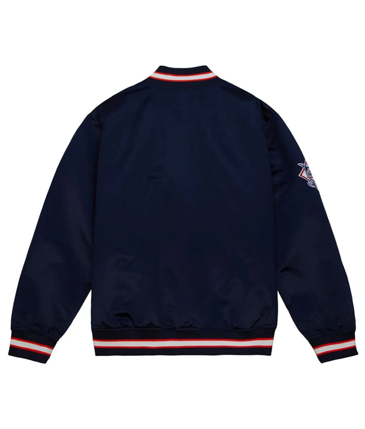 Navy blue jacket with red and white trim on a white background