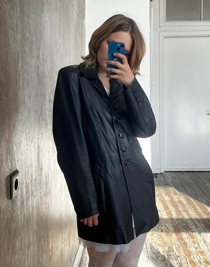 Black vintage leather jacket with button closure in American Market