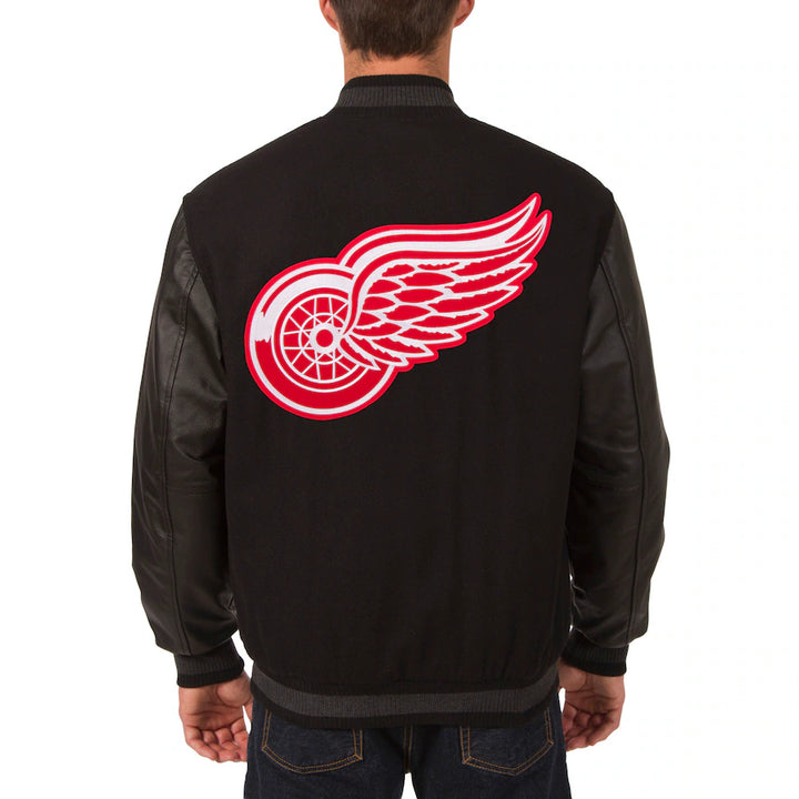 reversible detroit red wings jacket with wool torso and leather sleeves in USA