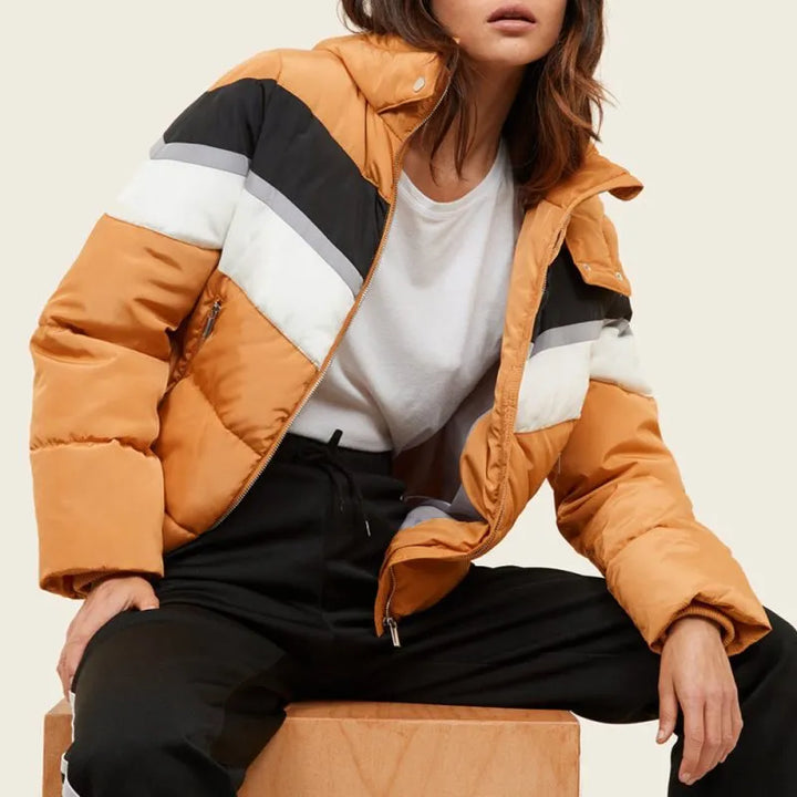 Quilted hooded puffer jacket worn by Mirren Mack in The Nest in USA