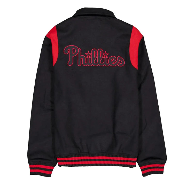 Black jacket with red accents and 'Phillies' logo on a white background in USA
