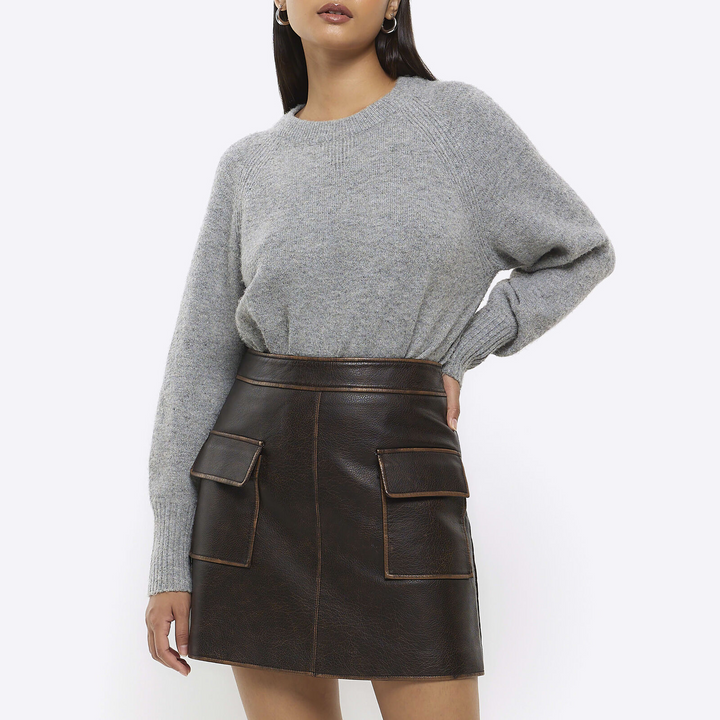 River Island distressed faux leather skirt with front pockets in France style