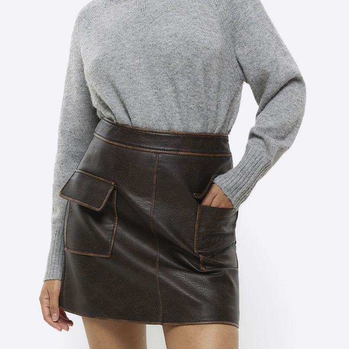 TJS River Island mini skirt in brown faux leather in American style