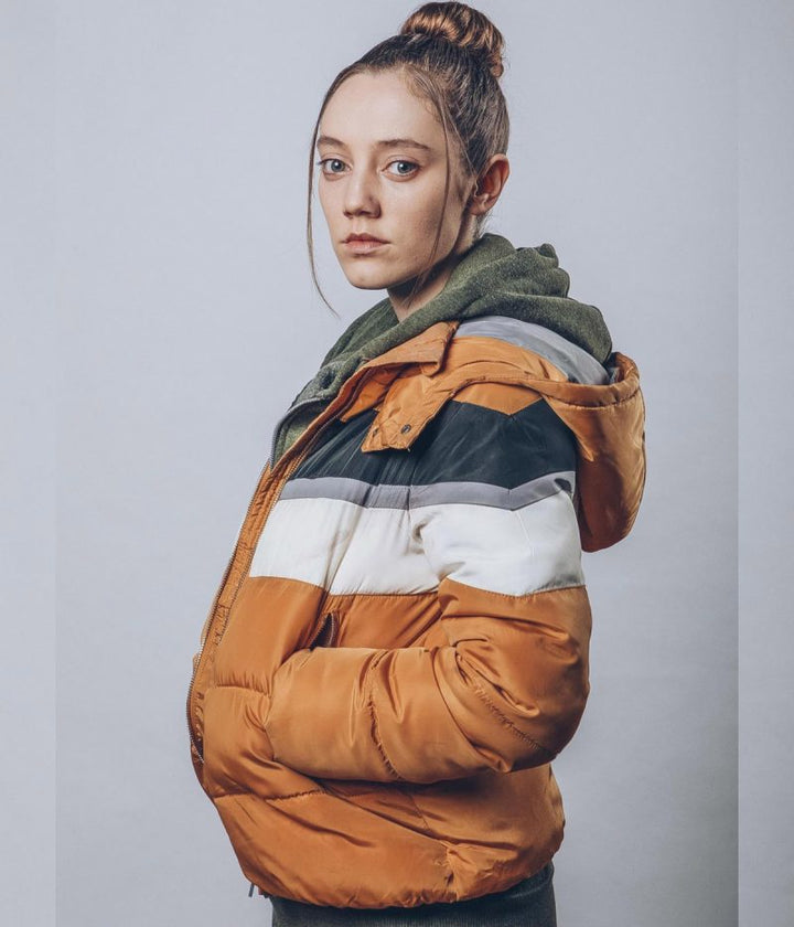 Stylish puffer jacket with hood inspired by Mirren Mack's look in The Nest in USA