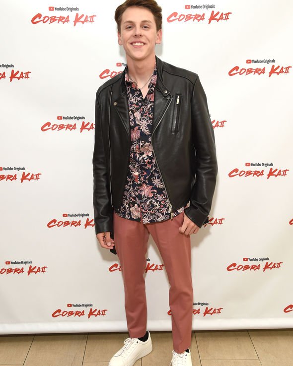 Jacob Bertrand leather jacket at Cobra Kai premiere event in USA