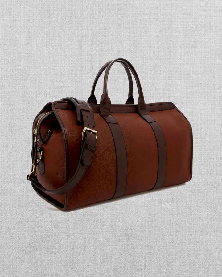 Sophisticated signature leather duffle for the modern traveler in American market